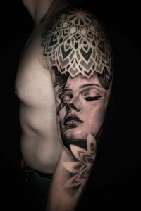 Realism and geometric tattoo by Leo
