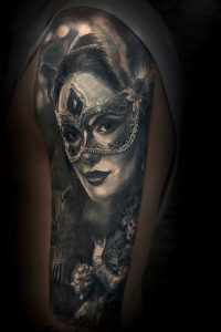 Black and grey Mertim tattoo masked woman